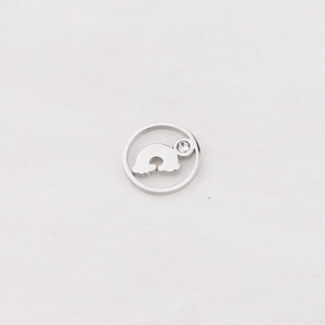 Close-up of silver hollow cloud and rainbow charm with a sparkling rhinestone inlay