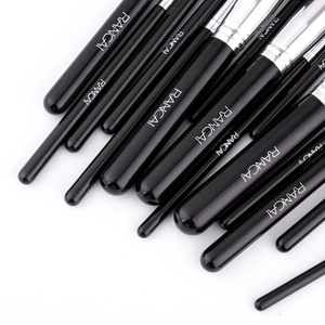 Professional 16-piece makeup brush set with black glossy handles and silver ferrule
