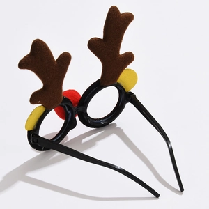 Detail view of Christmas reindeer antler glasses with brown plush and red nose decoration