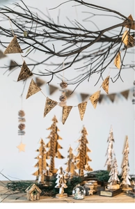 Close-up of rustic Christmas bunting made of natural birch bark with woodland textures