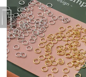 Macro shot of 18K gold and silver plated open jump rings for DIY jewelry making