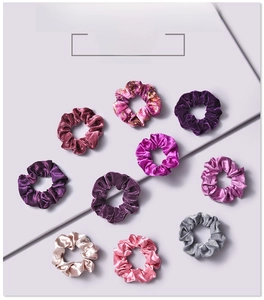 Detailed set of 10 assorted velvet and satin hair scrunchies in diverse elegant colors