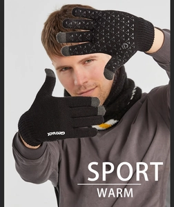Detail of winter knit gloves showing touch screen fingertips and non-slip silicone palms