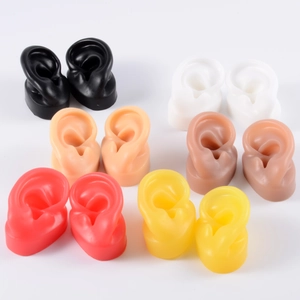 Detailed grid of silicone ear models in six colors for jewelry and ear stud display