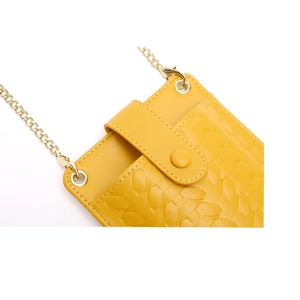 Vertical yellow quilted chain bag for women with gold hardware and flap closure