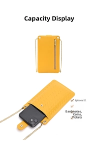 Detail view of woven yellow phone bag interior storing iPhone 11 and cash