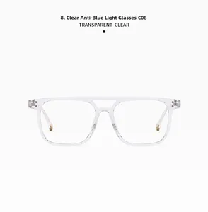 Detail of transparent square double-bridge frames with metal rivets and blue light lenses