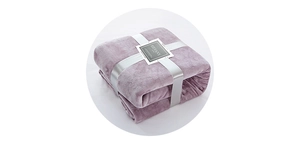Detail of purple flannel fleece blanket with silver ribbon gift packaging and soft texture