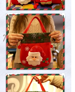 Détail d'un sac cadeau de Noël en feutre avec motif Père Noël 3D et broderies de flocons