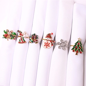 Set of 6 Christmas napkin rings with enamel bells and colorful rhinestone snowflake motifs