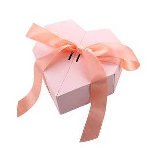 Pink heart-shaped double-door gift box with large ribbon bow for weddings and gifts