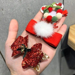 Set of 3 Christmas hair clips with reindeer antlers, velvet bows, and glittery sequins