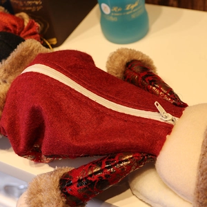 Christmas leather candy bag with Santa Claus design featuring red felt and white zipper