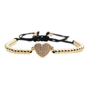 Women's 4mm gold beaded bracelet set with micro-paved zirconia heart charm and black cord
