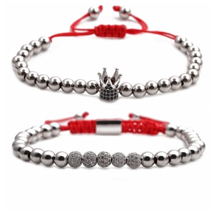 Adjustable red braided rope bracelet set with silver crown and crystal bead charms