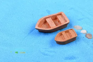 Miniature resin boat figurines with wood texture on blue sand for moss landscape decor