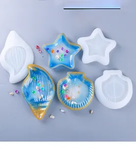 Macro detail of seashell and starfish silicone resin molds for DIY epoxy crafts