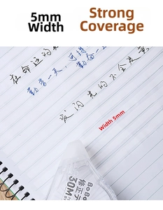 Detail showing high coverage of 5mm wide correction tape on notebook paper