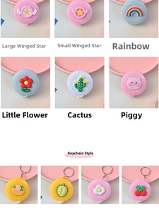 Macro detail of Nordic mini retractable tape measures with cute cartoon 3D PVC shapes