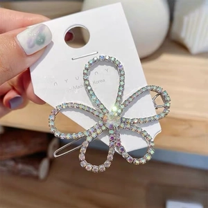 Detail of colorful crystal flower hair clip with silver alloy base and sparkling rhinestones