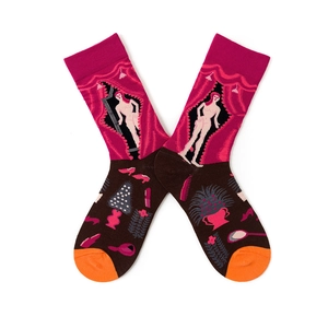 Detail of pink and brown socks with unique artistic pattern on a white background