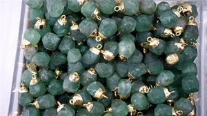 Green strawberry quartz faceted stone pendants with gold metal loops in bulk packaging