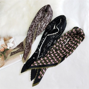 Three pleated silk scarves with floral and polka dot patterns for hair and neck styling