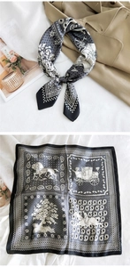 Classic carriage and rider print scarf styled on beige trench coat and flat lay view