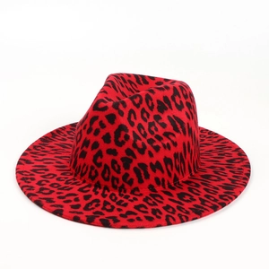Close-up of red and black leopard print wool felt fedora hat with wide brim texture