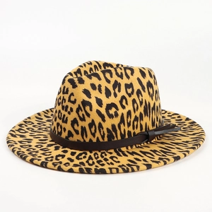 Detail of leopard print wool fedora hat featuring a wide brim and black leather band