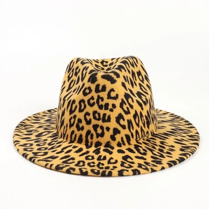 Detailed top view of leopard print fedora hat featuring a classic flat wide brim