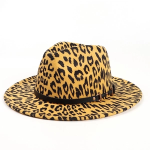 Detail of leopard print fedora hat featuring black leather band and gold metal buckle