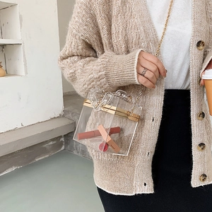 Transparent acrylic box bag with gold frame and chunky chain strap for women