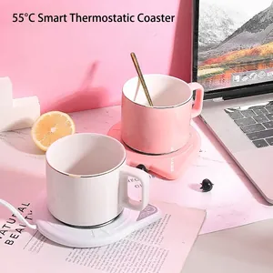 Smart 55°C constant temperature cup warmer coaster in pink and white for coffee and milk