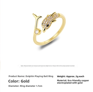 Macro detail of 18k gold plated dolphin ring with cubic zirconia and size specifications