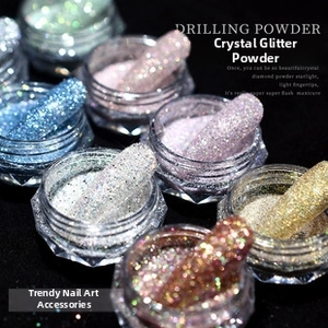 Close-up of sparkling nail glitter powder in various colors for professional manicure art