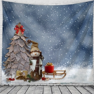 Detail of Christmas wall tapestry featuring a rustic tree, snowman, and snowy background