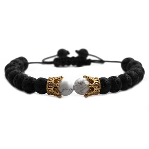Detail of 8mm lava rock and white turquoise beads with gold crown charms on adjustable bracelet