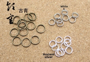 Detailansicht von Doppelspaltringen in Bronze, Weiß-K und Altsilber für DIY-Schmuckzubehör