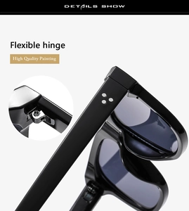 Detail view of durable flexible hinge and high-quality painting on black sunglasses