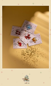 Detailed view of five Christmas cards with hand-drawn illustrations and warm festive decor