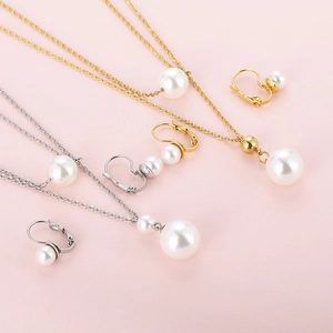 Elegant 18K gold and silver pearl necklace with matching earrings jewelry set
