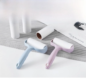 Lint roller set with light blue and purple handles plus three replacement paper refills