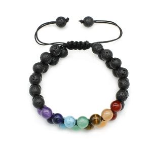 Detail of woven lava rock seven chakra bracelet with adjustable cord and colorful beads