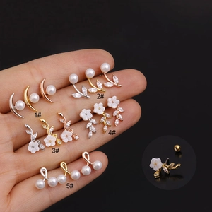 Minimalist pearl earrings set in gold and silver flower designs for women