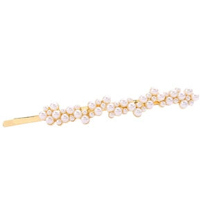 Barrette dorée élégante ornée de perles blanches pour une finition métallique