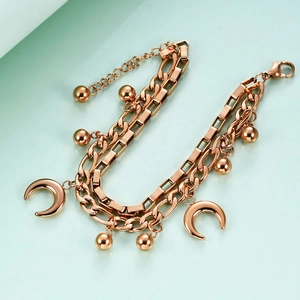 Rose gold double layer Cuban chain bracelet with crescent moon and metal bead pendants