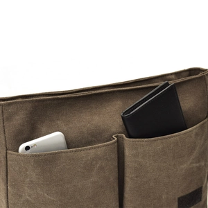 Men's dark brown canvas messenger bag with dual pockets for phone and wallet storage
