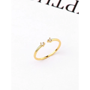 Detailed view of minimalist gold adjustable ring with two sparkling zircon stones