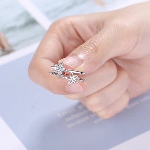 Double-layered silver floral open ring with sparkling zircon and cutout flower detail